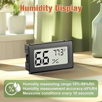Digital hygrometer som visar 66 procent relativ luftfuktighet